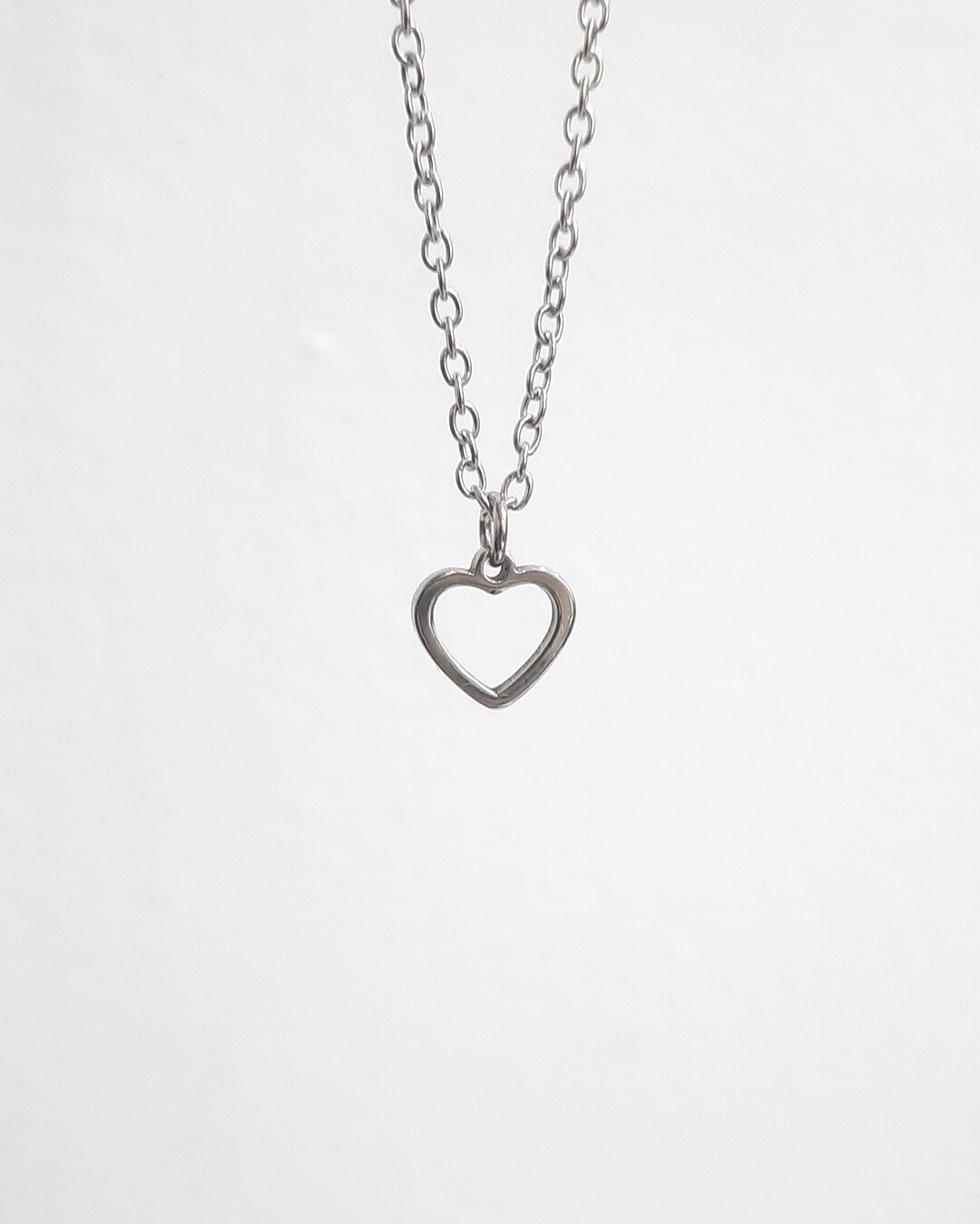 Colgante con forma de corazón de acero inoxidable