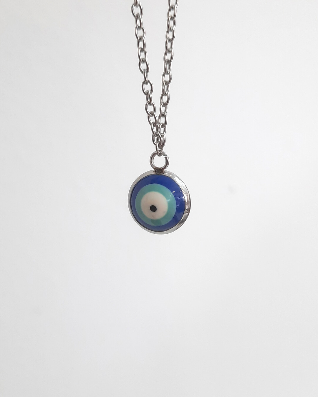 Colgante con forma de ojo de turco esmaltado en azul de acero inoxidable