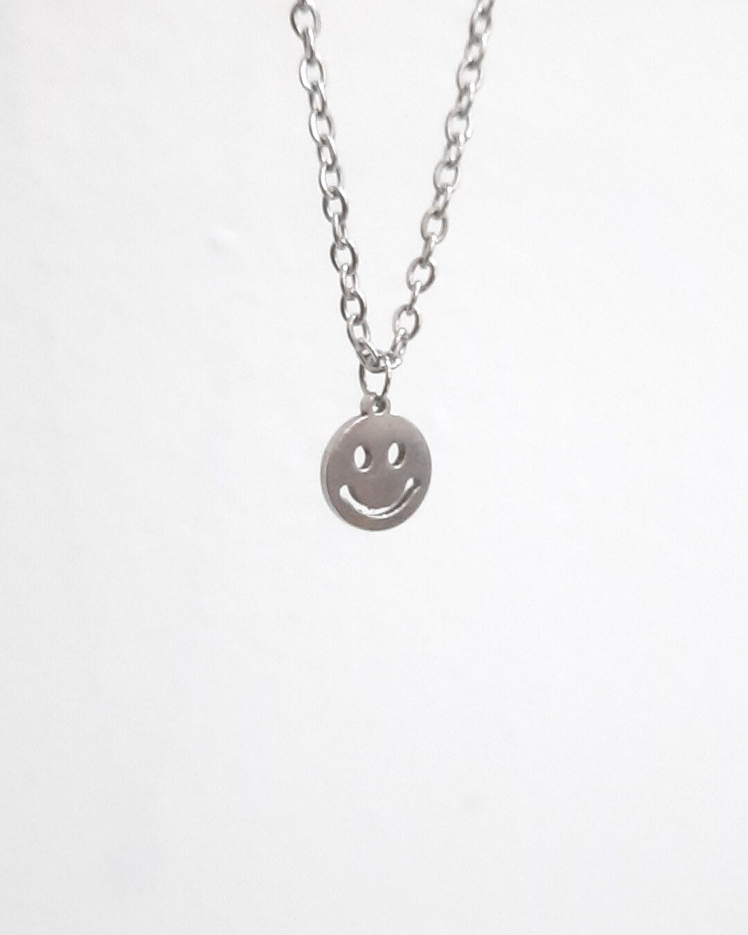 Colgante con forma de smiley de acero inoxidable